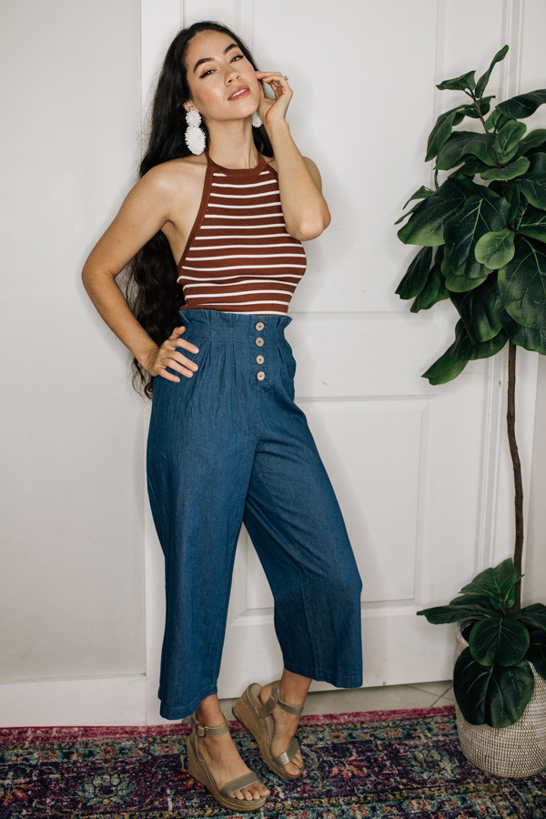 HIGH WAIST CHAMBRAY PANTS WITH
FRILL AND BUTTON DETAIL.
100% COTTON.
SMALL 2-6
MEDIUM 8-12
LARGE14-16