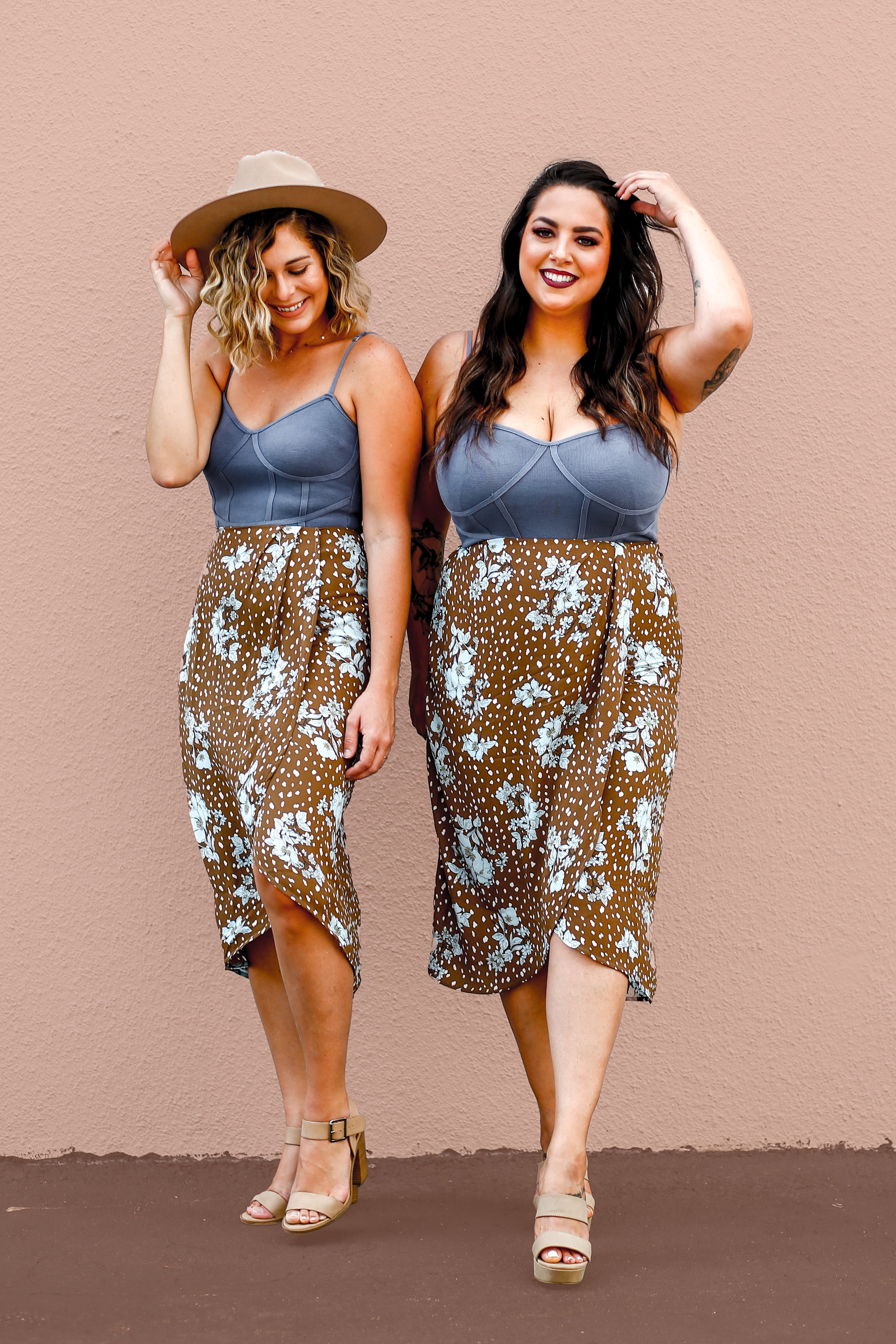MAVERICK EXLCUSIVE! SAME FABRIC AS OUR KENT PANTS. FAUX WRAP STYLE SKIRT. MIDI LENGTH. ZIP UP BACK. NO ELASTIC ON WAIST. 100% POLYESTER. STEPHANIE IS 5’4” SIZE 4 WEARING A SMALL.
XS 0-2
S 4-6
M 8-10
L 10-12
XL 12-14