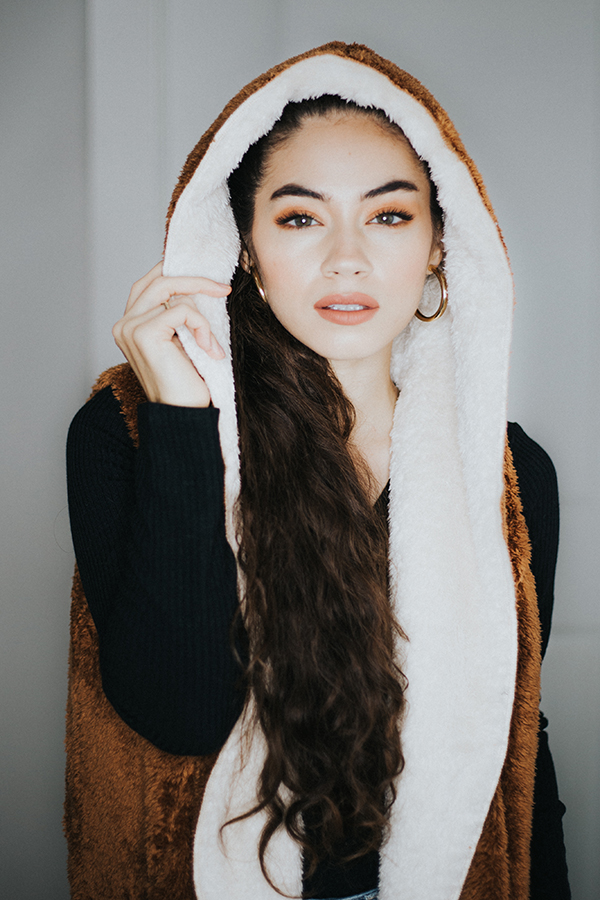 FUR VEST. WHERE ARE MY NORTHERN GIRLS AT? THIS SO SOFT FURRY VEST WILL BE ABLE TO KEEP WARM ALL WHILE LOOKING LIKE THE CUTEST LITTLE ESKIMO THERE EVER WAS. A LITTLE BIT LONGER, POCKETS AND A HOODIE ALSO MAKE THIS VEST A FAVORITE. YOU CAN REVERSE THE COLOR