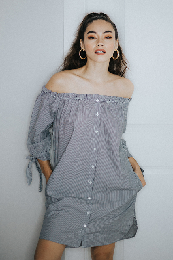 PIN STRIPE OFF THE SHOULDER DRESS. NANTUCKET VIBES WITH THIS AMAZING DRESS. BUTTONS ALL THE DOWN AND ELASTIC AROUND THE NECKLINE TO ENSURE THE DRESS STAYS IN PLACE OFF THE SHOULDERS.