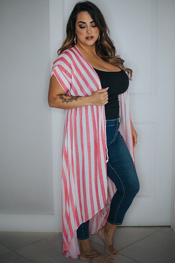 OFF WHITE/ RED STRIPE KIMONO.
HI/LOW HEM AND TIE AT NATURAL WAIST
100% RAYON
SMALL 2-8 MEDIUM 10-16 LARGE 18-24