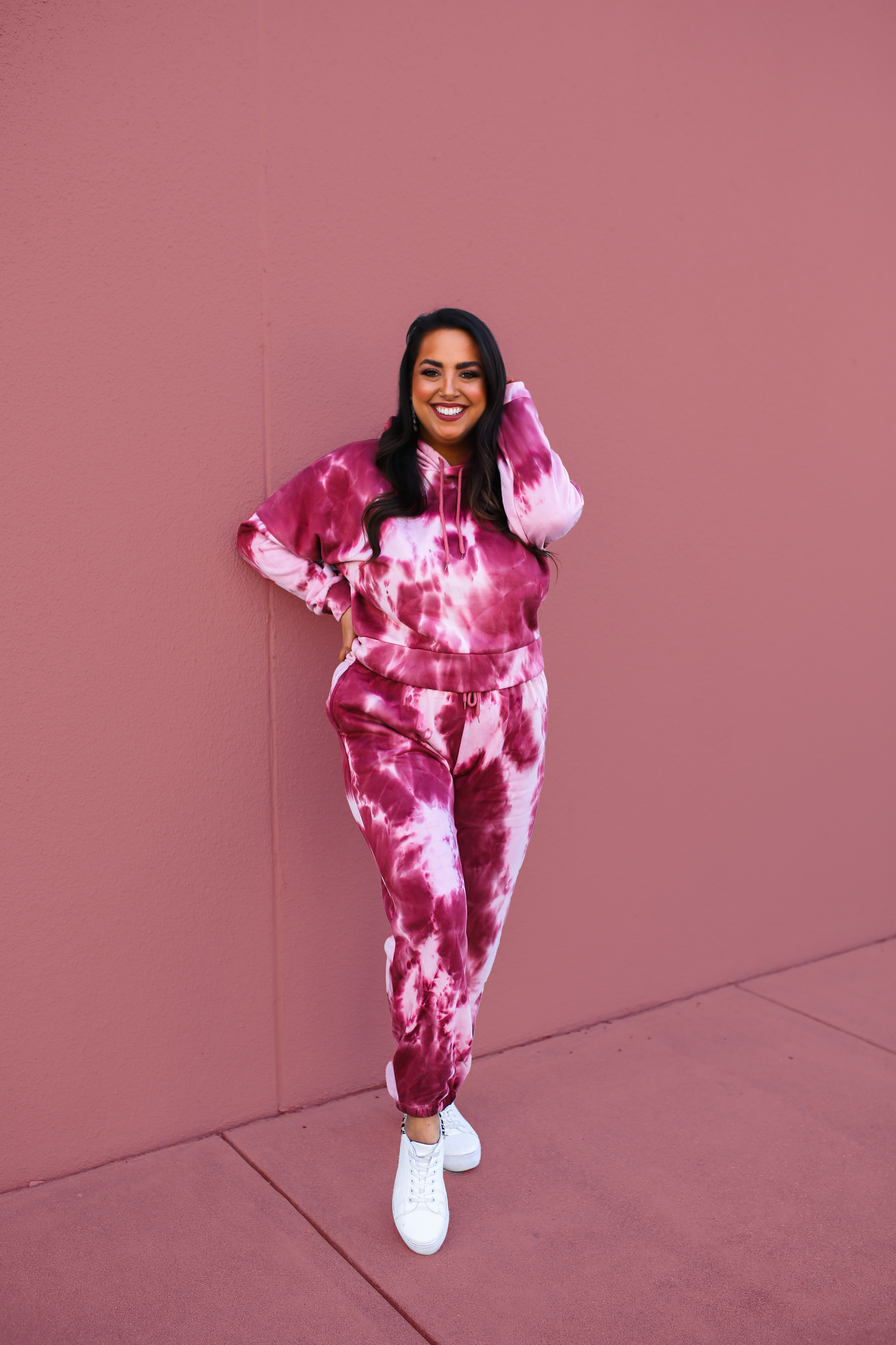 BURGUNDY AND PINK TIE DYE HOODIE/JOGGER SET. DROP SHOULDER, FULL LENGTH HOODIE WITH FUNCTIONAL DRAWSTRINGS. JOGGERS FEATURE ELASTIC WAIST WITH FUNCTIONAL DRAWSTRING, SIDE POCKETS AND CUFFED ANKLES. SUPER SOFT FLEECE-LIKE LINING. 92% POLYESTER, 8% SPANDEX.