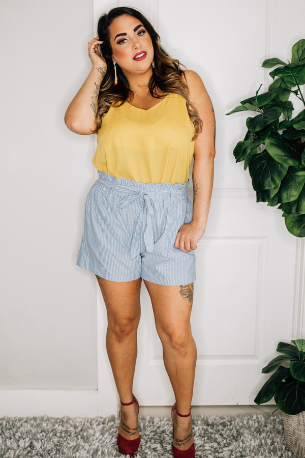 PLUS SIZE PAPER BAG WITH BOW SHORTS. TIE YARN DYE STRIPE. COMES IN BLACK/WHITE, BLUE/WHITE, AND KHAKI/WHITE COLOR COMBOS.
100% COTTON
XL 10-12
1X 12-14
2X 14-16