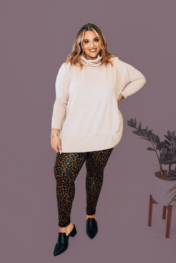 OATMEAL COWLNECK LONGSLEEVE SWEATER WITH SIDE SLITS. 95% POLY 5 % SPANDEX. STEPHANIE IS SIZE 4 WEARING A SMALL. NIKI IS SIZE 14 WEARING AN XLARGE.
S 0-4
M 6-10
L 10-12
XL 14-16