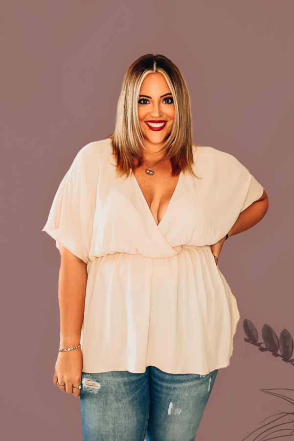 CREAM, DEEP V-NECK, SURPLICE TOP. ELASTIC FITTED WAIST WITH A FLOWY BODY. AVAILABLE IN TWO COLORS – CREAM AND BURGUNDY. 100% POLYESTER. PIPER IS SIZE 0, WEARING A SMALL. NIKI IS SIZE 14 WEARING XLARGE.
XS 0-2
S 4-6
M 8-10
L 12-14
XL14-16