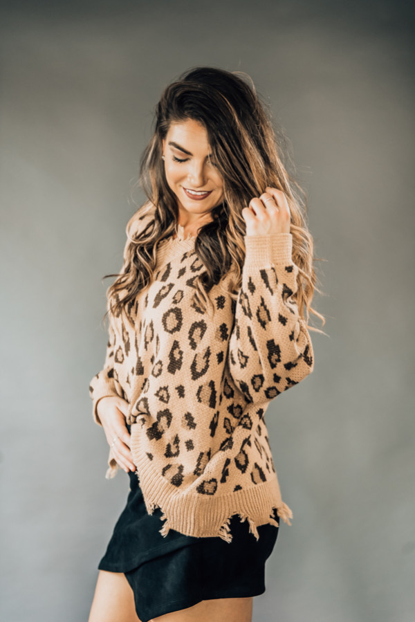 TAN AND BROWN LEOPARD PRINT SWEATER WITH DISTRESSED FINGE DETAIL AT NECK AND BOTTOM. MODEL INFO: SISSY - SIZE 6, 5’6”, WEARING A SMALL.
100% ACRYLIC
SMALL 2-6
MEDIUM 6-12
LARGE 12-16