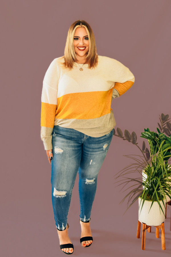 CREAM, MUSTARD, GREY COLORBLOCK SWEATER. 100% ACYYIC. PIPER IS A SIZE 0, WEARING A SMALL. NIKI IS A SIZE 14 WEARING AN XLARGE.
S 0-4
M4-8
L 8-12
XL 12-16
