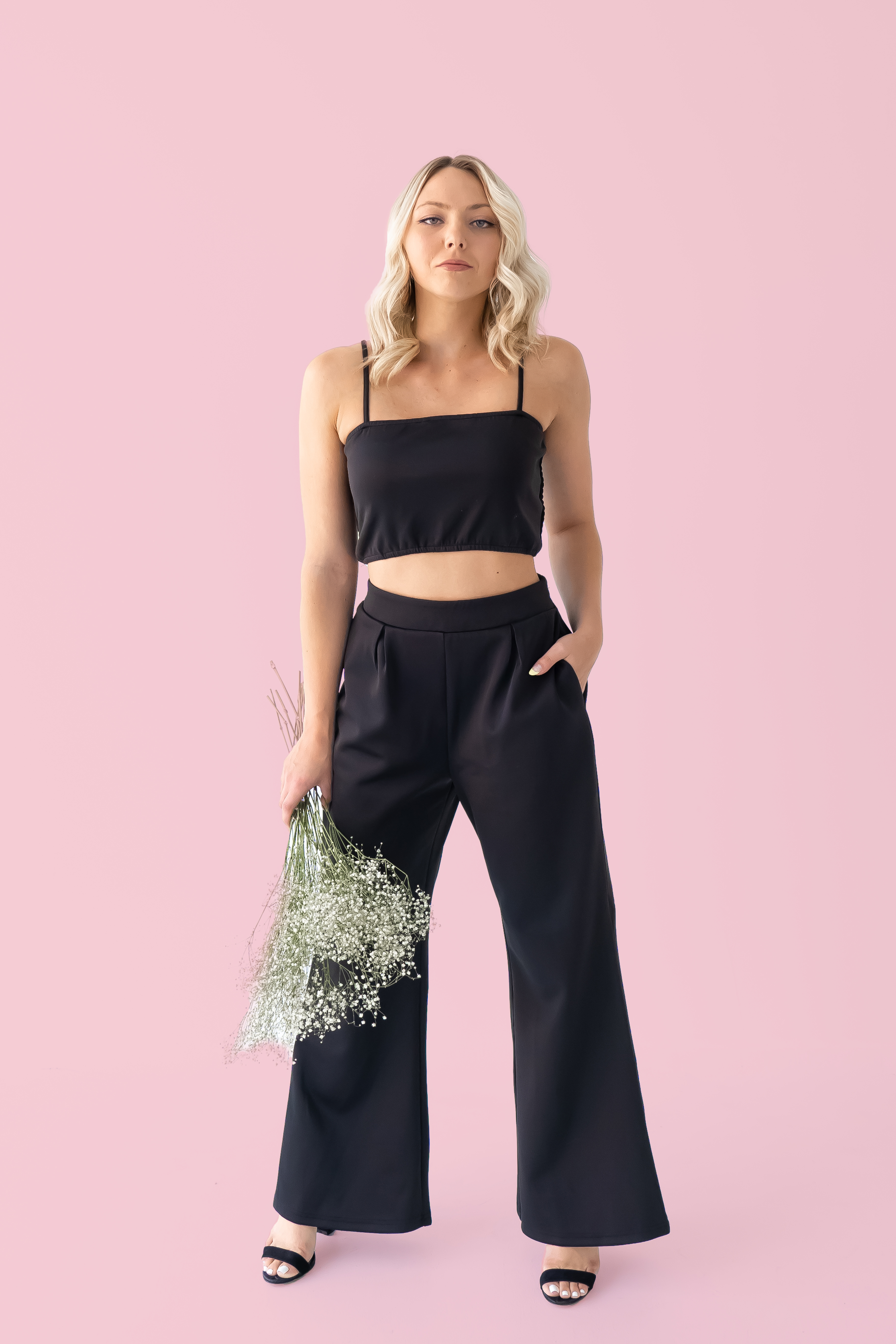 EXCLUSIVE TO MAVERICK! SET FEATURING WIDE LEG PANTS WITH HIGH WAIST, TAILORED LOOK. TOP IS BANDEAU STYLE WITH ADJUSTABLE STRAPS. RUCHING ON BACK MAKES IT VERY STRETCHY. THICK, SOFT, PREMIUM FABRIC. 100% POLYESTER.