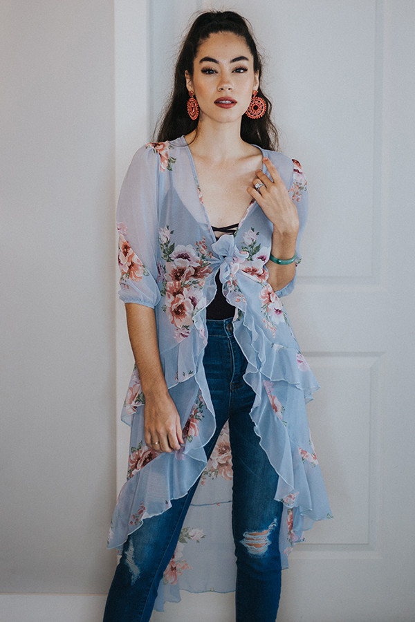 BLUE FLORAL KIMONO TIE FRONT. TIERED RUFFLED FRONT/HEM.
SEMI-SHEER. 100% POLYESTER
SMALL 4-6 MEDIUM 8-10 LARGE 12-14