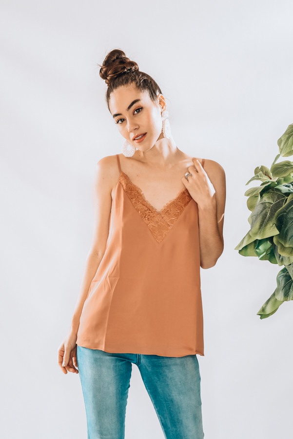 V-NECK CAMI WITH LACE DETAIL AND ADJUSTABLE STRAPS. ALSO COMES IN BLACK. MODEL INFO: PIPER-SIZE 0, WEARING A SMALL
100% POLYESTER
SMALL 0-4
MEDIUM 6-10
LARGE 12-14
