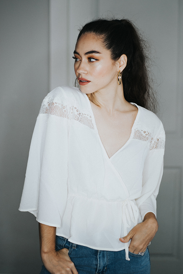 BOHO CREAM COLORED BLOUSE. BELL SLEEVES AND LACE DETAIL ON TOP. A TAD SHORTER IN THE WAIST.