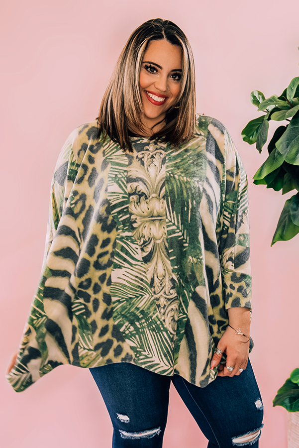 ABTRACT ANIMAL PRINT PONCHO TOP. LOOSE, FLOWY FIT FEATURING ROUND NECKLINE AND 3/4 SLEEVES. MODEL INFO: PIPER – SIZE 0, 5’5” WEARING A SMALL. NIKI – SIZE 14, 5’4”, WEARING A LARGE.
68% POLYESTER, 29% RAYON, 3% SPANDEX
SMALL 0 -6
MEDIUM 8-12
LARGE 14-18