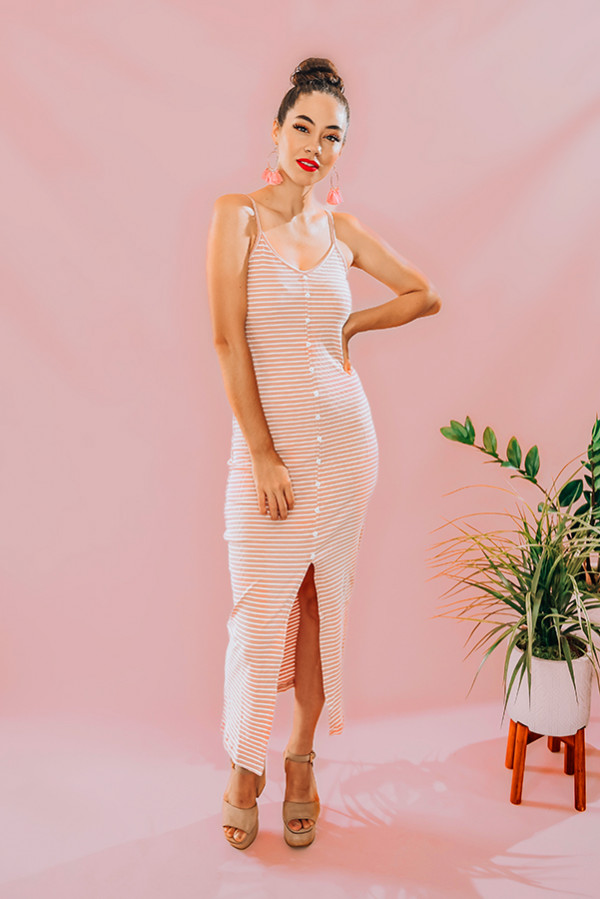 Very stretchy bodycon dress. Adjustable straps, button detail and higher slit. Hits mid shin. 95% cotton, 5% spandex. Piper is 5’4 , size 0 wearing a Small. Niki is a size 14, wearing a size Large.
XS 0-2
S 4-6
M 8- 10
L 12-14
XL 16-18