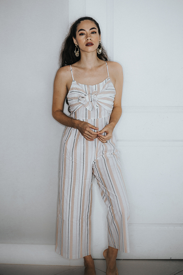 – STRIPED JUMPER. ADJUSTABLE TIE FRONT AT BUST, ZIPPER ON SIDE AND CROP WIDE LEG PANT. RUNS A LITTLE SMALL.