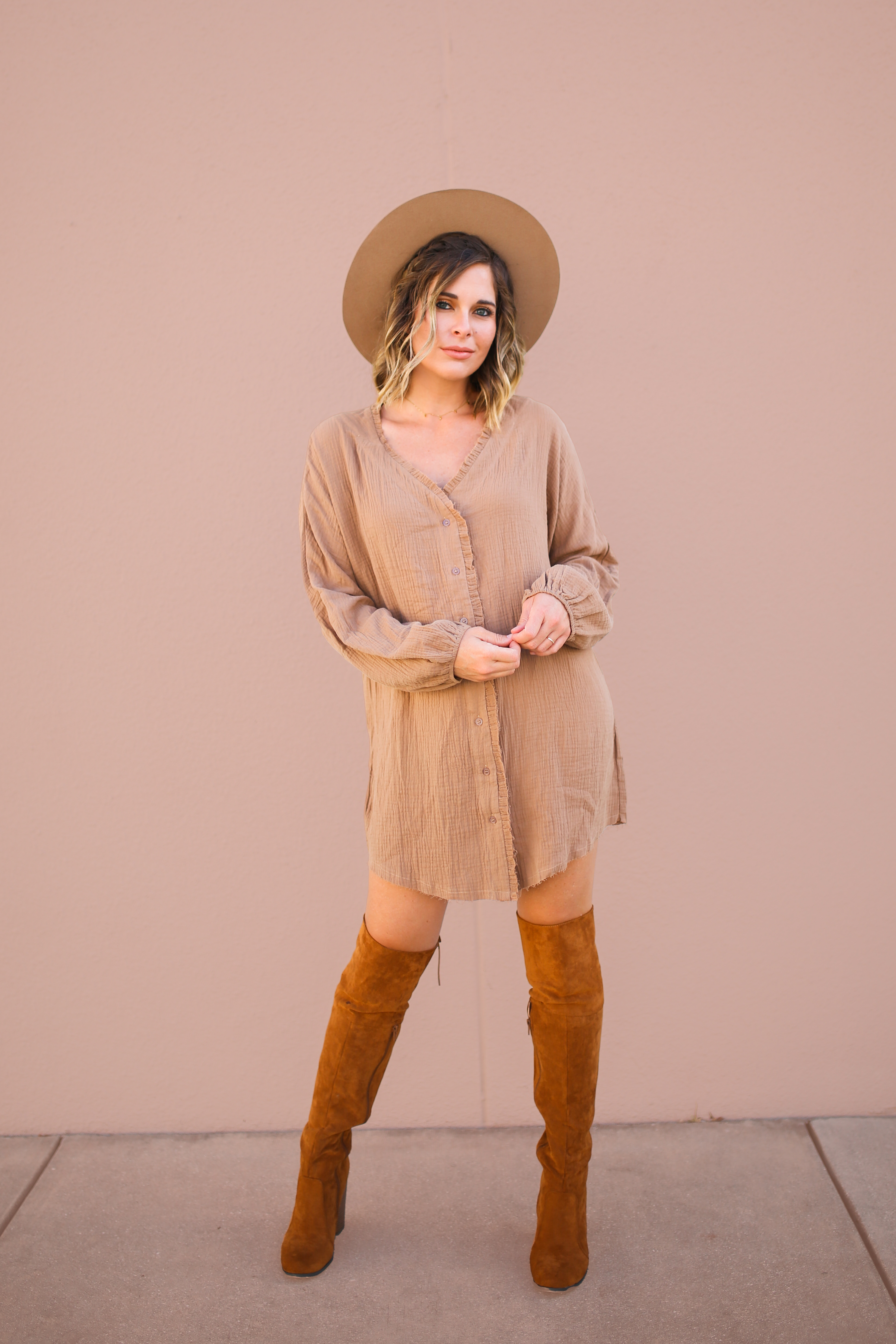 MAVERICK EXCLUSIVE! LONG SLEEVE, BUTTON UP THAT CAN BE WORN AS A TUNIC OR DRESS. DROP SHOULDER WITH ELASTIC AT WRISTS. LIGHTWEIGHT MATERIAL WITH DISTRESSED EDGES. 100% COTTON. AMANDA IS 5’7 SIZE 2, WEARING SMALL. GABBY IS SIZE 10/12 WEARING XL.
