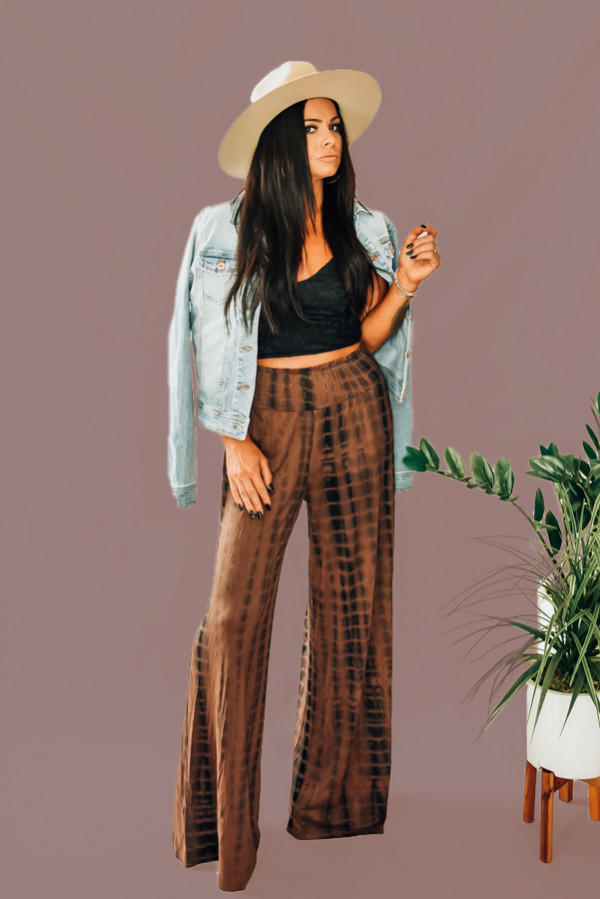 BLACK AND BROWN TIE DYE WIDE LEG PAINTS WITH ELASTIC WAIST. AVAILABLE IN TWO COLORS - BLACK/BROWN TIE DYE AND SOLID BLACK. 100% RAYON. STEPHANIE IS A SIZE 4, WEARING A SMALL. NIKI IS SIZE 14 WEARING AN XLARGE.
XS 0-2
S 4-6
M 8-10
L 12-14
XL 16-18