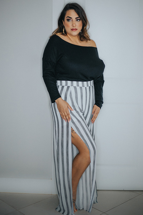 BLACK/WHITE STRIPE PANT WITH SLIT OPENINGS ON SIDES.
100% RAYON
1X- 14-16 2X - 18-20 3X 22-24