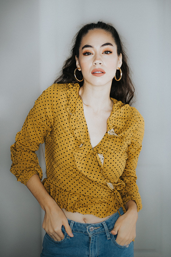 – POLKA DOT BLOUSE. CHOICES, CHOICES, CHOICES. WE HAVE 3 COLOR CHOICES FOR YOU WITH THIS STYLE. BLACK, BLUSH AND MUSTARD. THIS SLIGHTLY RUFFLED BLOUSE IS A LITTLE SHORTER IN THE WAIST BUT CAN BE SIZED UP FOR MORE COVERAGE.